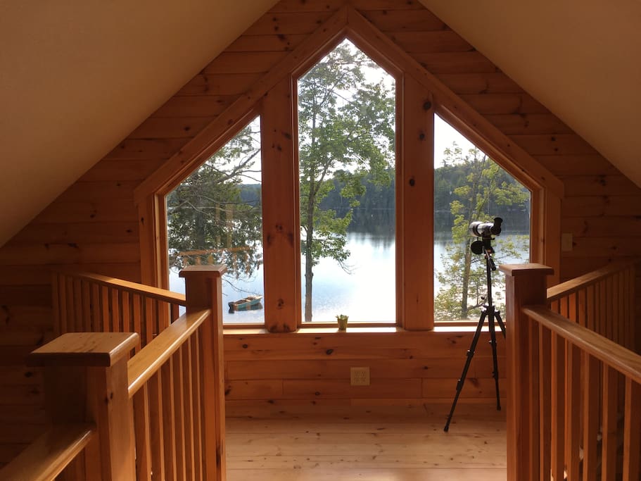 Upstairs catwalk with a lake view