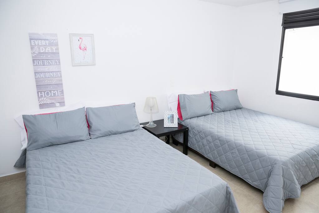 2 Queen-size beds. 1 bathroom