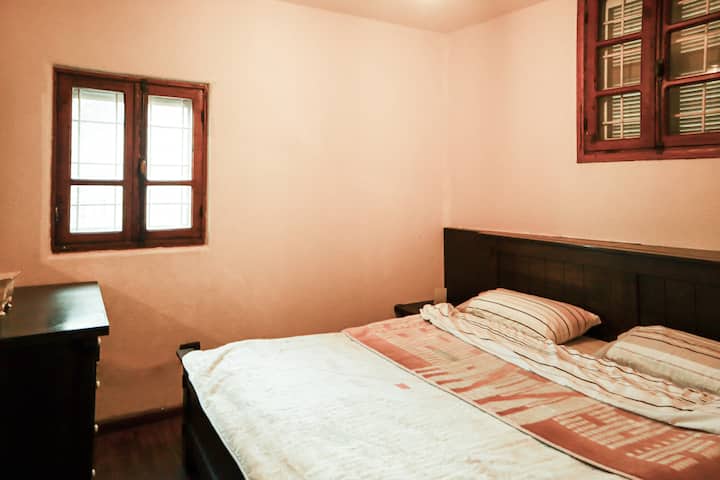 Master Bedroom with a double bed and private bathroom