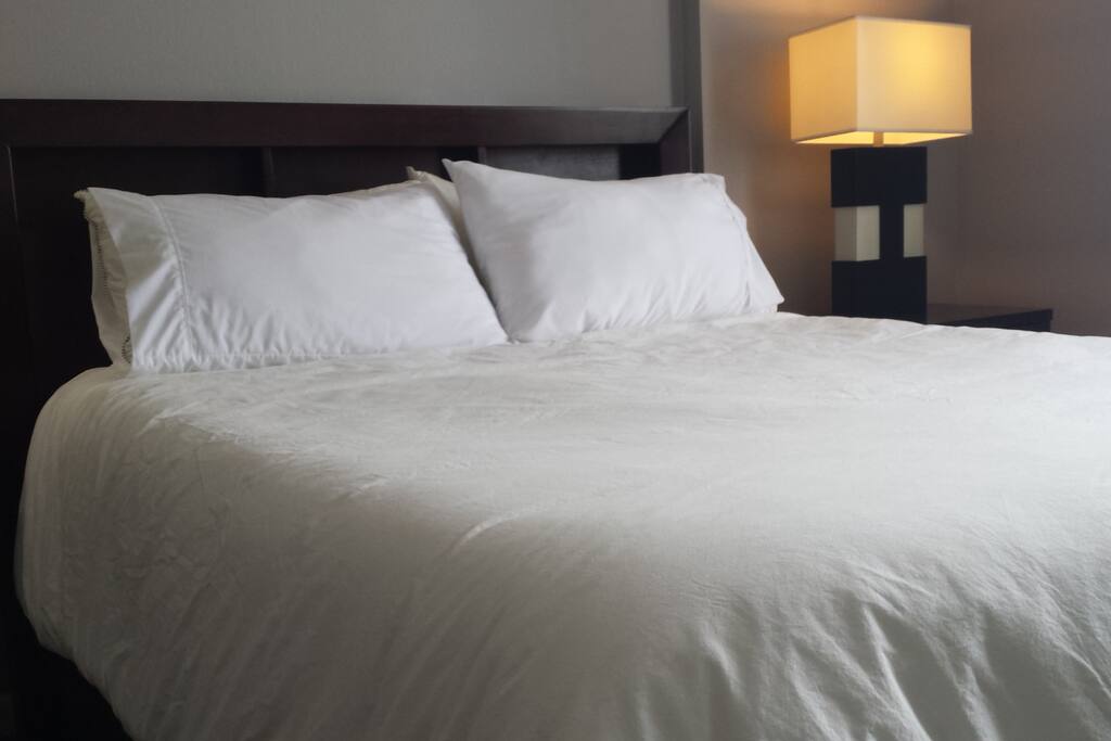 Comfy queen size bed with memory foam topper