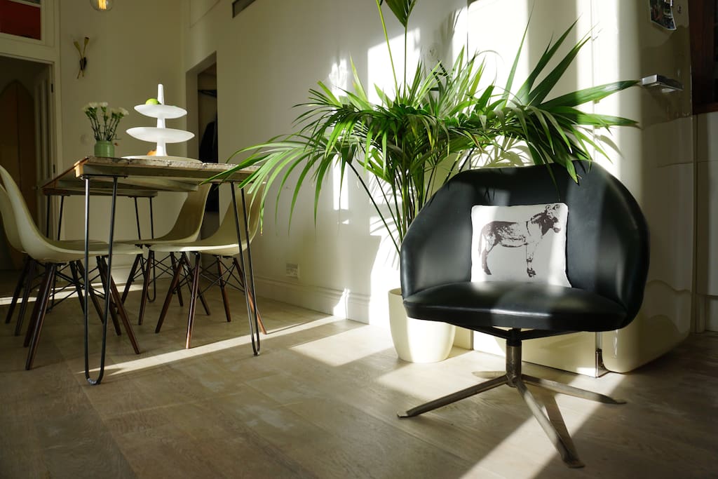 Lots of sunlight floods the main room from the big double doors