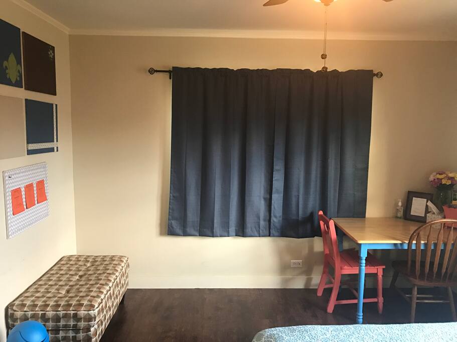 Ottoman to the left and table seating to the right