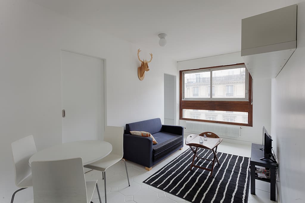 Living room (The sofa has been replaced by a real sofa which turns into a comfortable double bed)