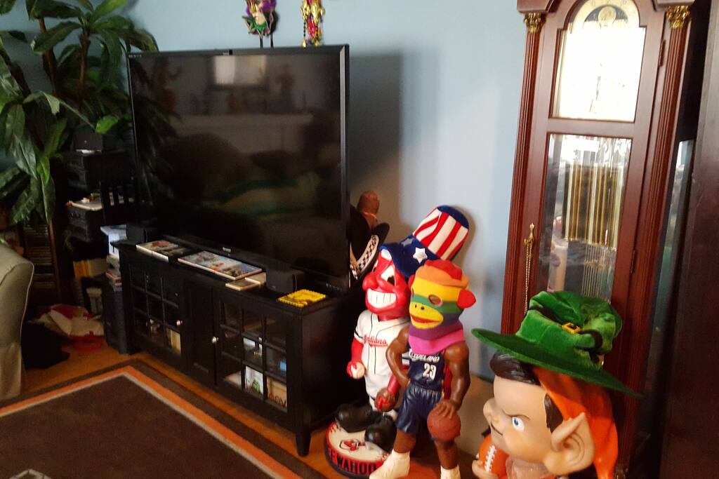 The Living Room. 70 inch tv with dish satellite service.