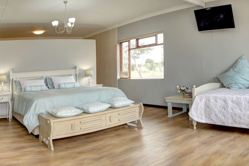 Room 3 - King sized bed, with shower, Jacuzzi bath , double basin and toilet. Air conditioning and Cable TV in Room