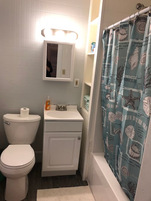 Bathroom with towels and extra toiletries just in case.
