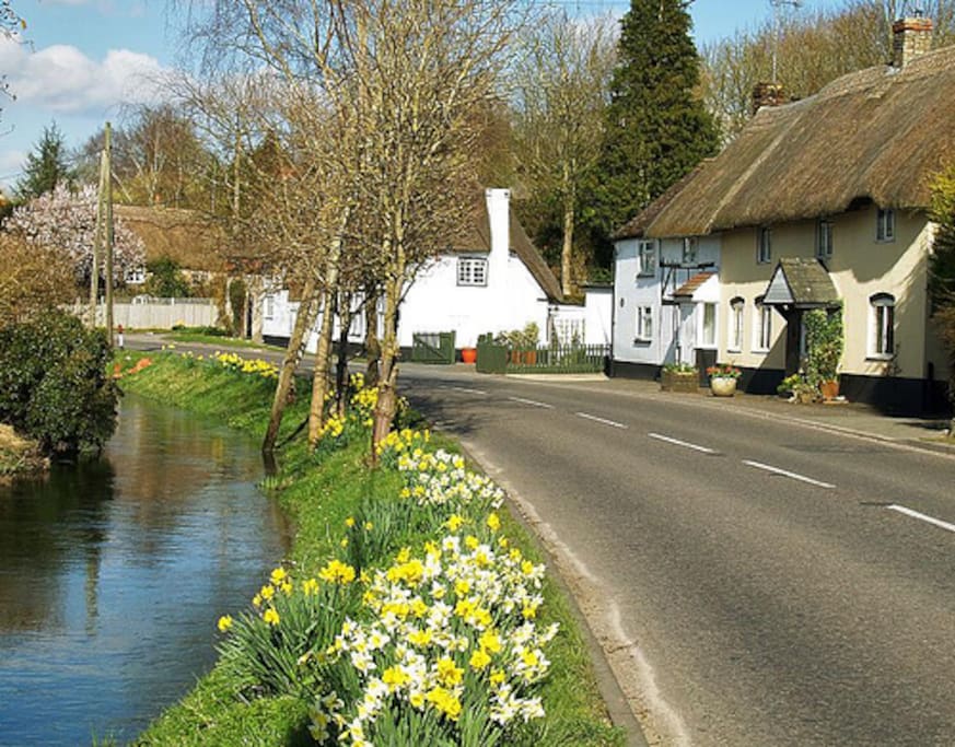 Beautiful village with the seasonal bourne .