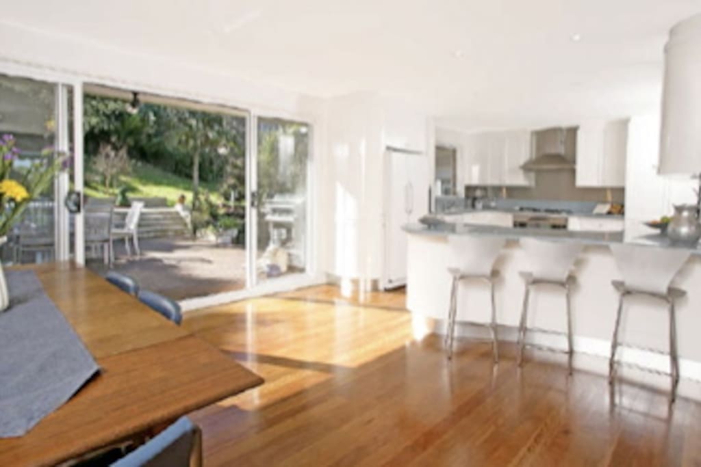 Dining and kitchen area and backyard view.