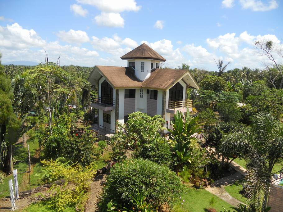 House and flower gardens protected by electric security fence