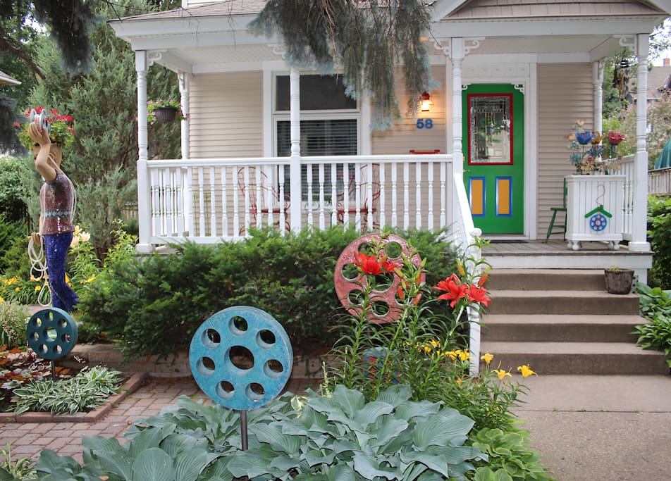 Welcome to Bobbin House! The brightly painted front door and garden sculptures makes us easy to find.