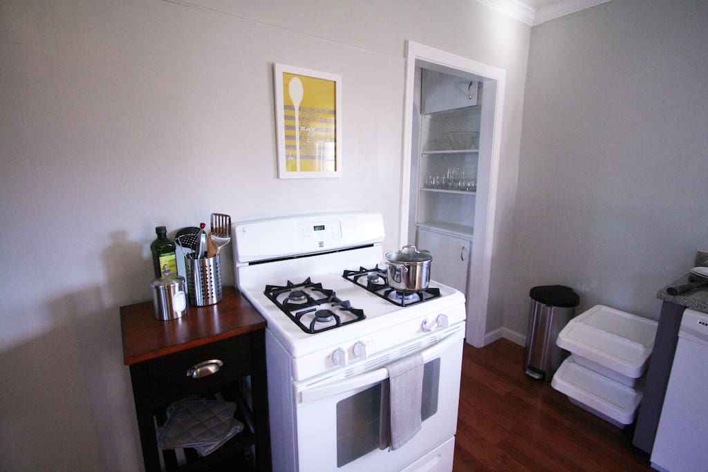 Kitchen: Gas range and Emeril stainless pots and pans