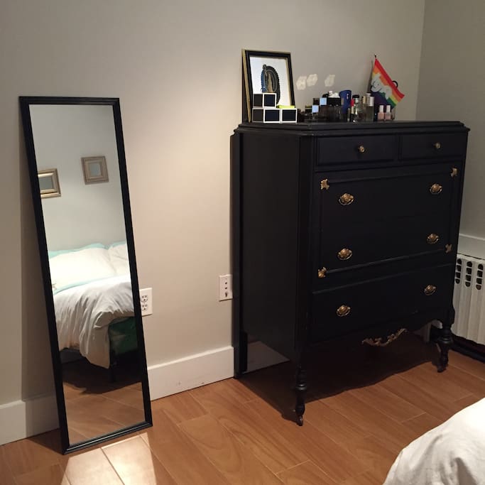 Mirror for last-minute touch-ups. Dresser for extra storage.