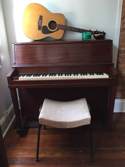 Piano and guitar for guest use.