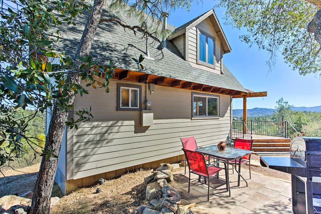 Have a barbecue on the patio featuring a gas grill and an outdoor table.
