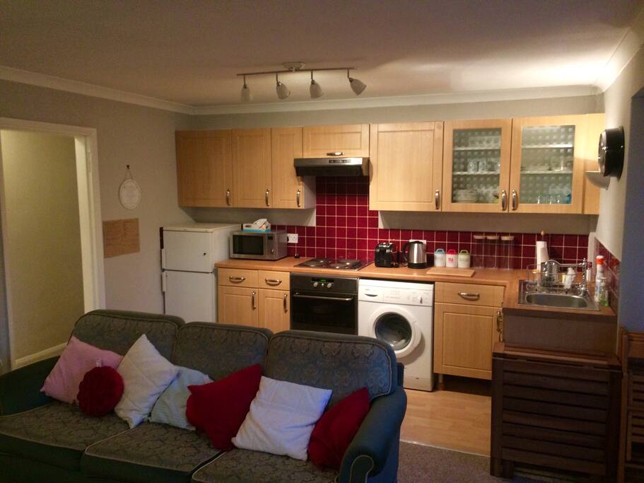 Washing machine, cooker, combined fridge freezer, wet area, cupboard space. Perfect for self-catering but plenty of takeaways nearby.