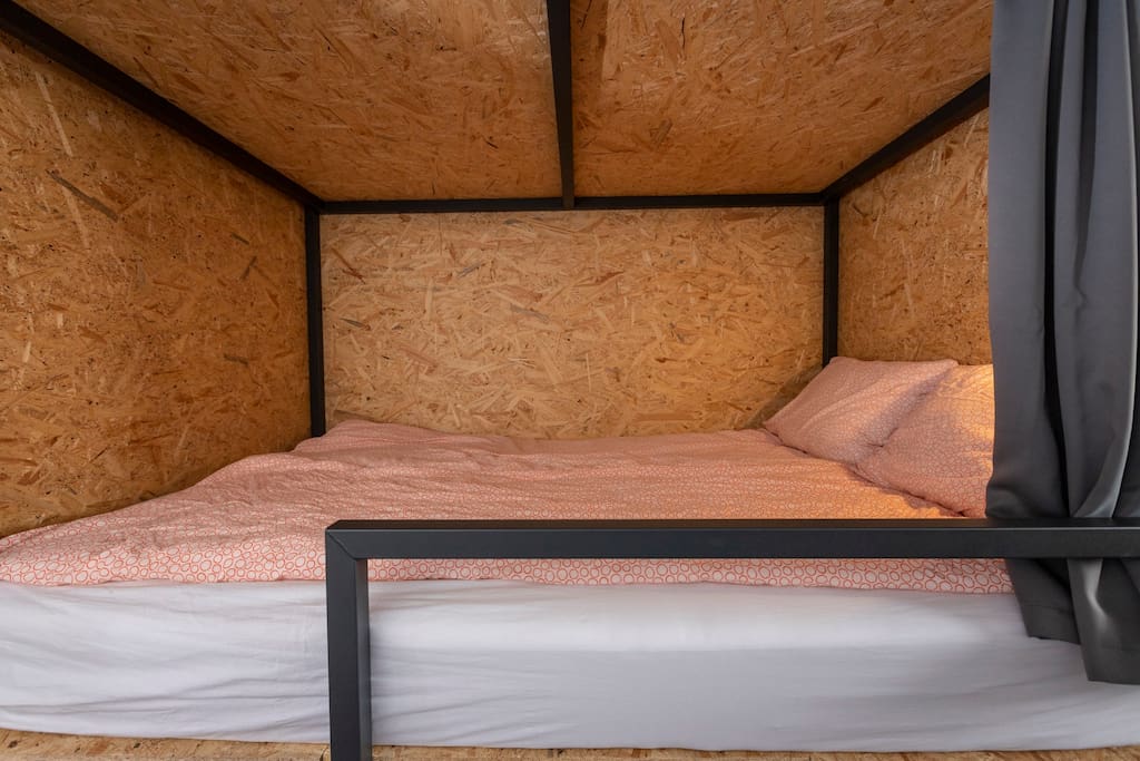 Our custom built double bunk beds are 140×200 cm wide.