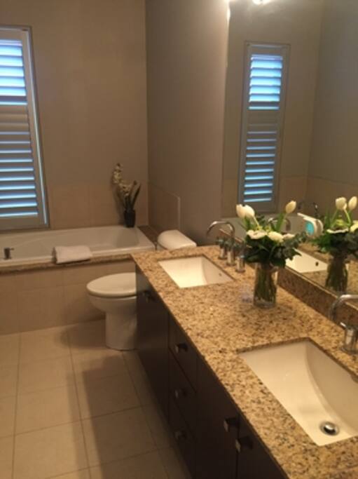Master Bedroom bathroom , separate shower stall, tub and 2 sinks, granite counter top