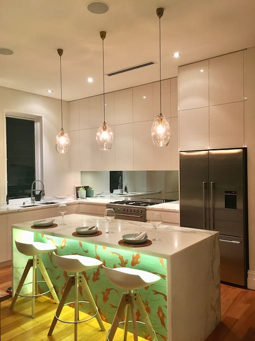 Beautiful open spacious marble kitchen with high end appliances.