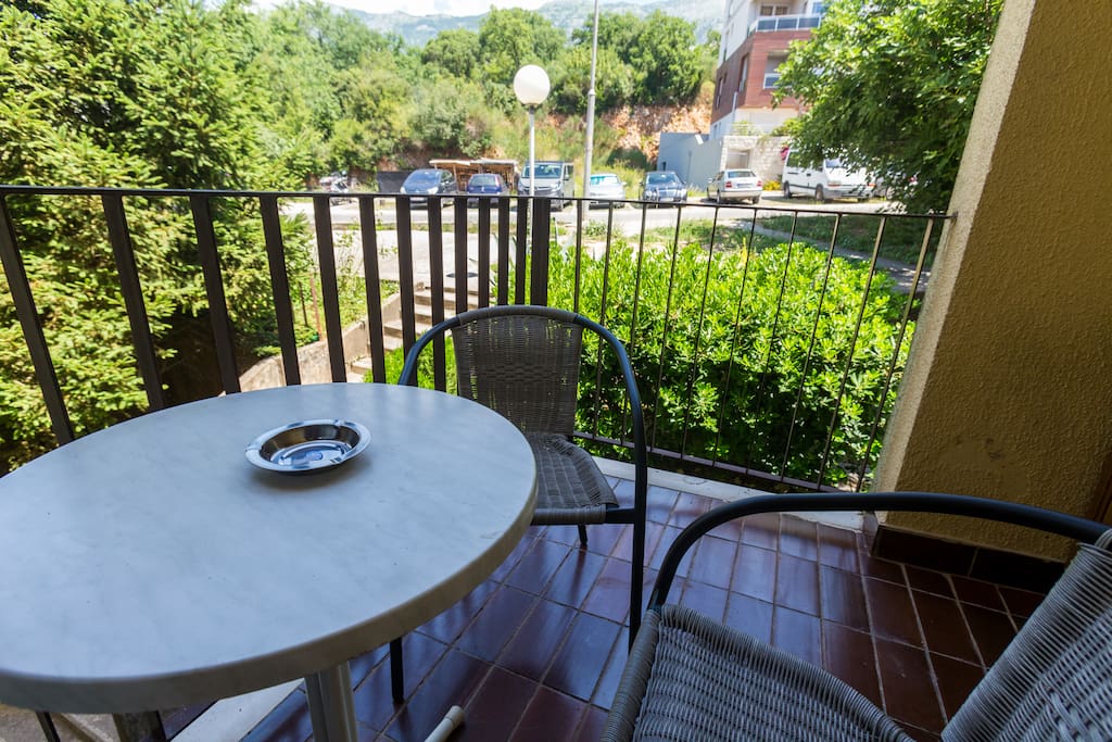 Apartment is set on a first floor of the residential building and offers a quiet street view in a shade.