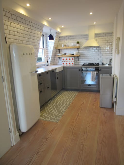 New kitchen with dishwasher.