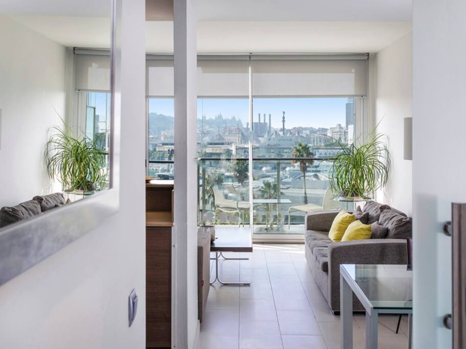 Open plan living area with balcony