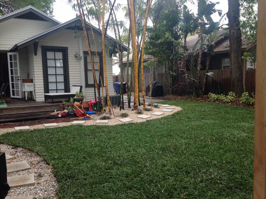 Garden (and flamingo) view from your room. You're welcome to use our main home's deck and patio furniture.