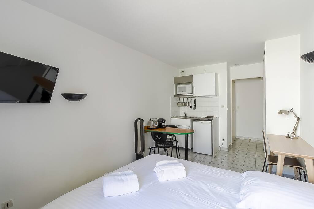 Bright room with a flat screen television