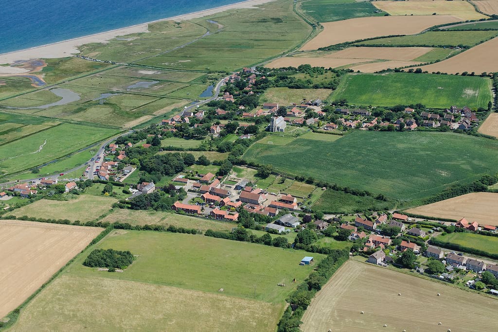 The stunning salt marsh setting of Salthouse, right on the North Norfolk coast AONB. Aerial shot supplied by kind permission - John Fielding Aerial Images, Copyright 2018