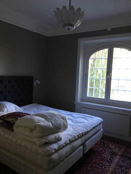 Master bedroom with large closet and a full master bath with a hotel feel which includes a rain forest shower. Top floor which looks over the roof of beautiful Matteus church. Completely private.