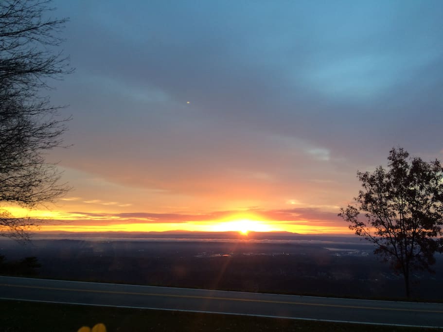 Morning sunrise from the kitchen window, sunroom, and master bedroom