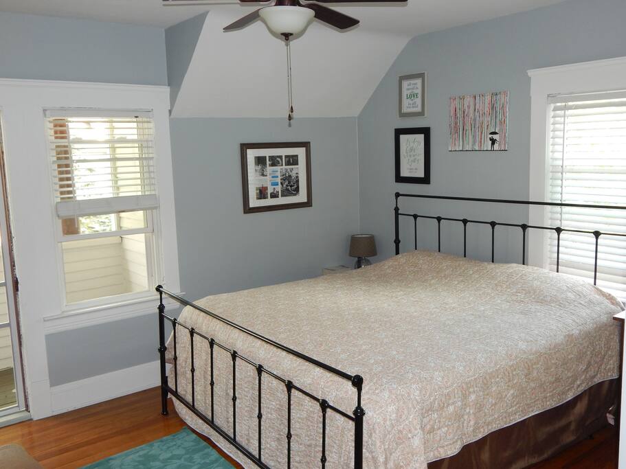 Spacious bedroom including a king sized bed and walkout balcony