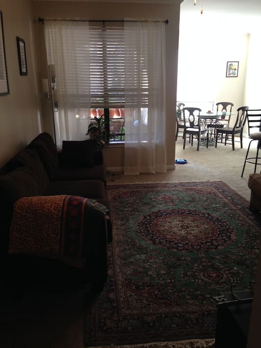 Living Room + Dining Room with Adjacent Balcony