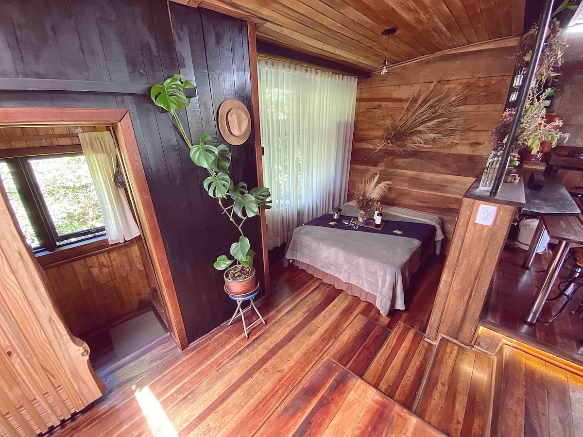 On the left, the bathroom door. 