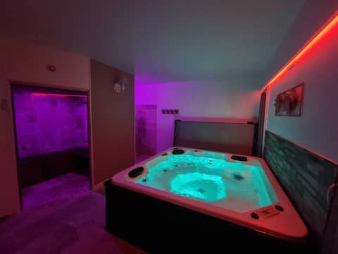 Encantadora suite con bañera de hidromasaje privada y hammam