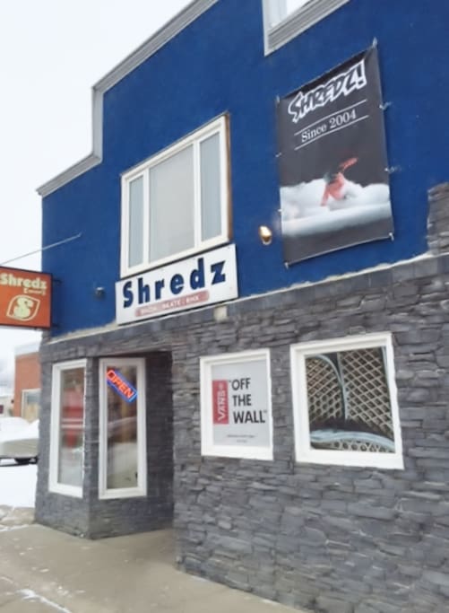 Front of the building. Below is Shredz Shop business.