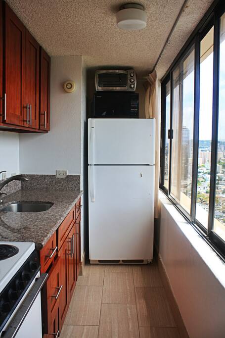 Full kitchen with coffeemaker, fridge, etc.