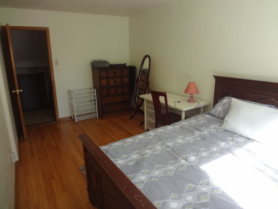Bright bedroom with own bathroom right outside