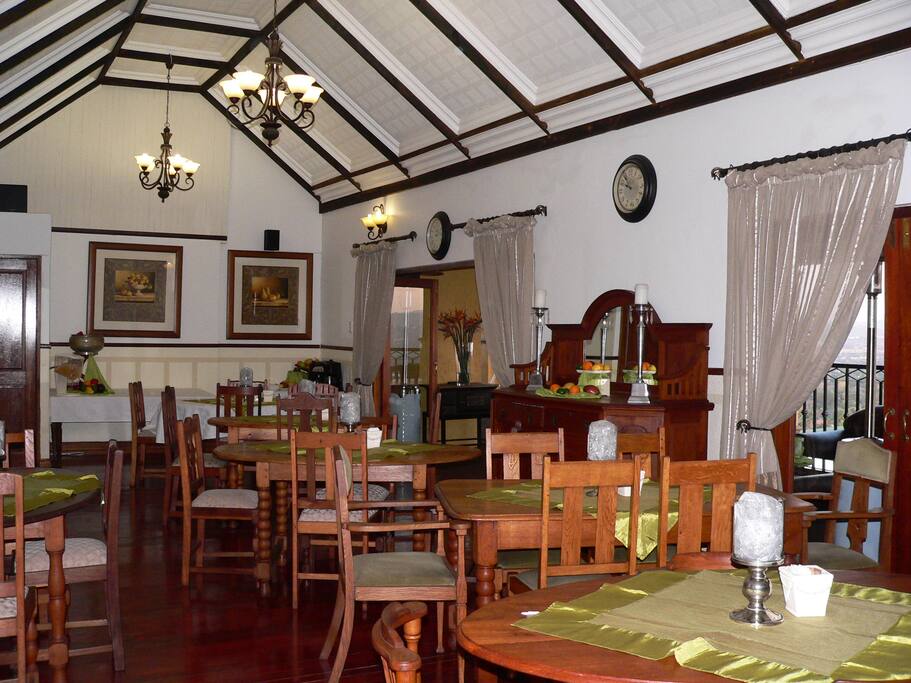Our Dining room with a warm homey ambiance were you can have your breakfast or dinner overlooking the city