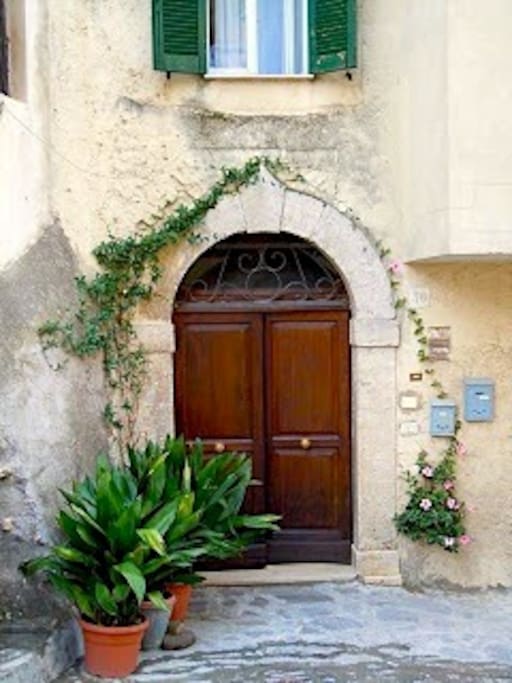 The 16th Century front door opens onto a little 'piazza'.