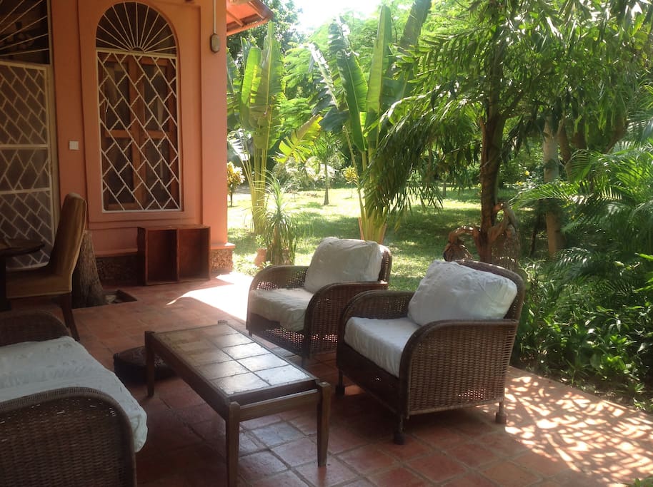 Outdoor living verandah with beautiful tropical gardens