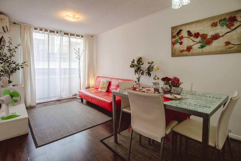 Living and dining room, you can see the air conditioner unit