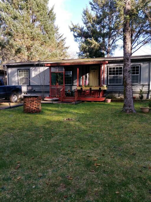 A View From the front with a covered porch.