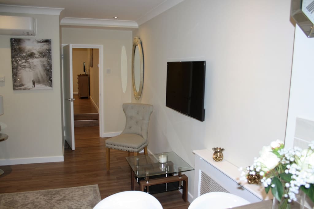 Comfortable living area with Smart TV and WiFi throughout the apartment.