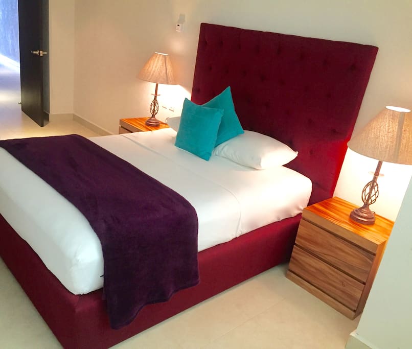 Super comfortable bed featuring this cozy bedroom