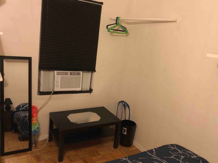 All things Inside the room,the bed is behind a picture