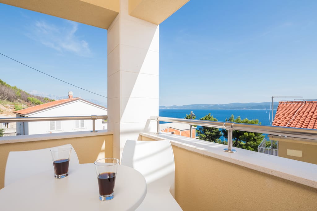 Apartment 1 Loggia with outdoor seating with views to the Adriatic Sea