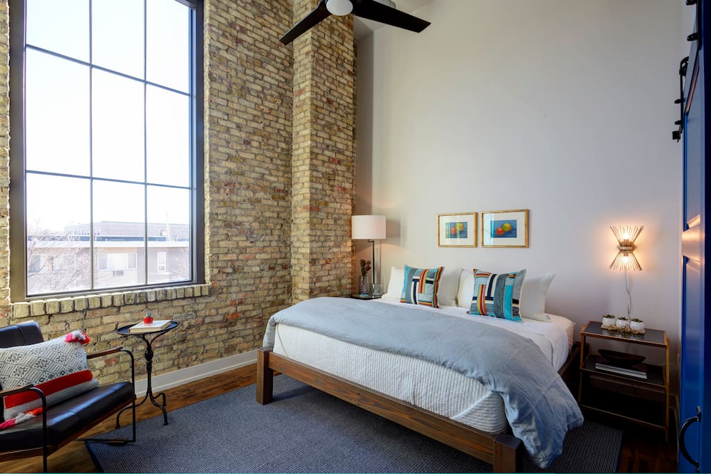 Suite 2: This 350 sq ft King loft space comes w/ exposed brick, pillow top Omaha Bedding mattress, Brooklinen Sheets cotton, sitting space, walk-in spa, high speed internet, Apple TV and cable.