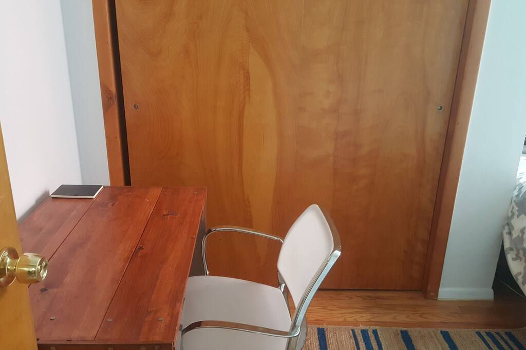 Small desk/table for your use in your bedroom along with large closet