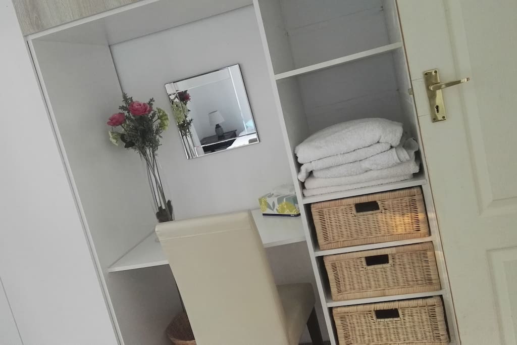 Dressing table with plug point which could double as a desk. Wifi is available to all guests