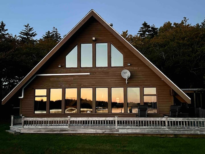 Lake front chalet with hot tub!